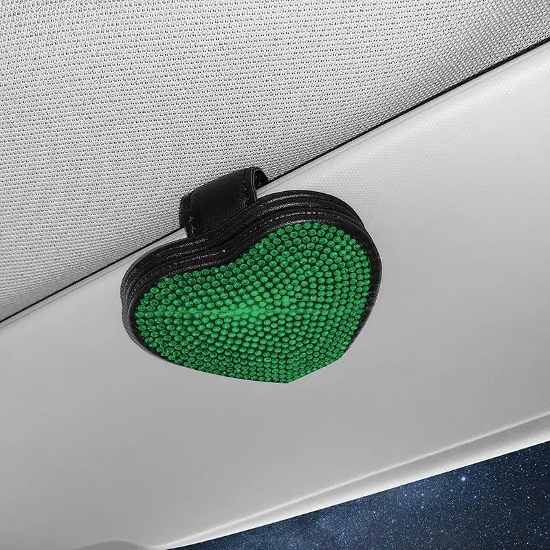 Black PU leather magnetic car sun visor clip holding sunglasses with a slot for tickets.