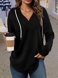 Women's V-neck hooded sweatshirt in black or red with long sleeves and loose fit