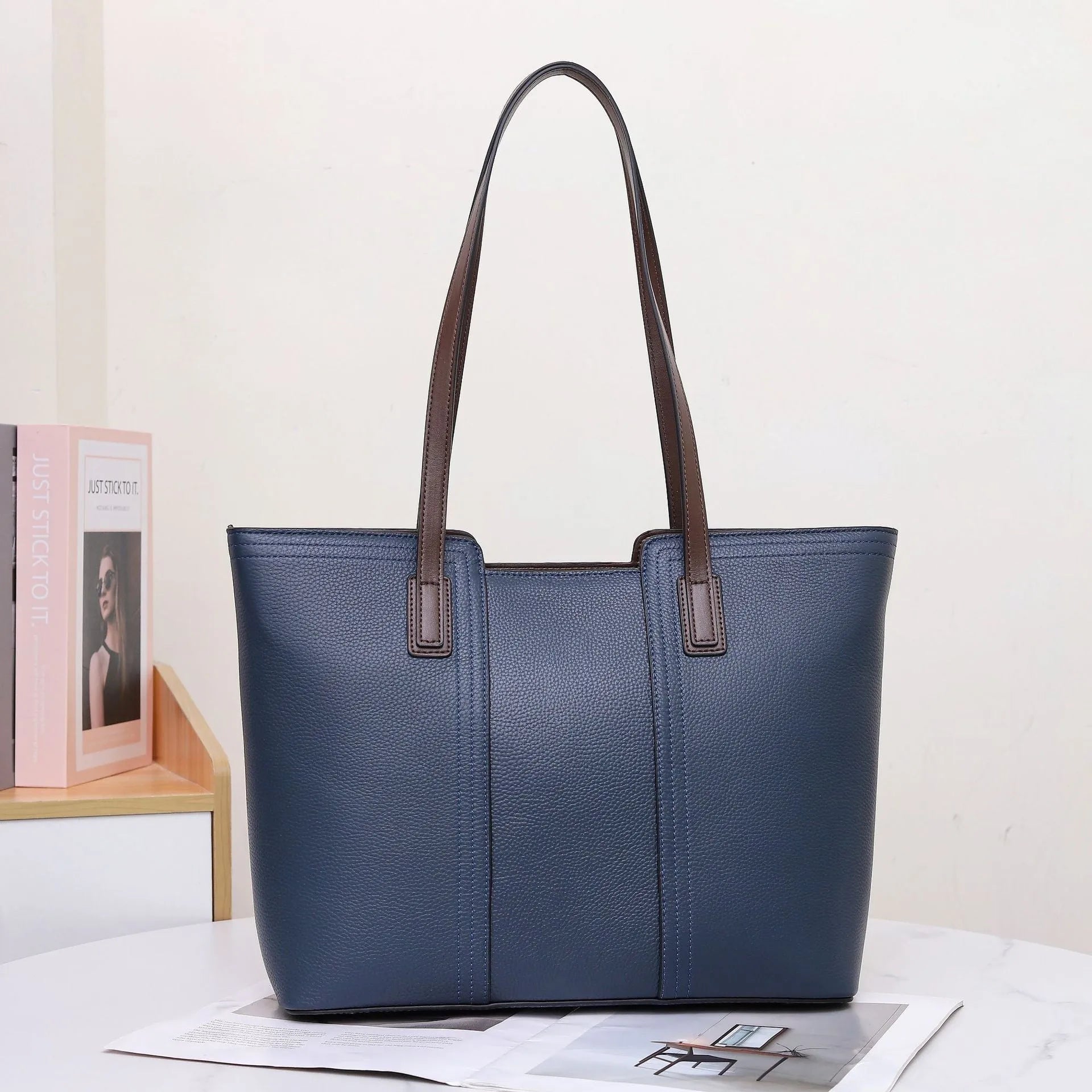 Women's genuine leather shoulder bag in box-type design with mobile phone compartment, shown in multiple colour options