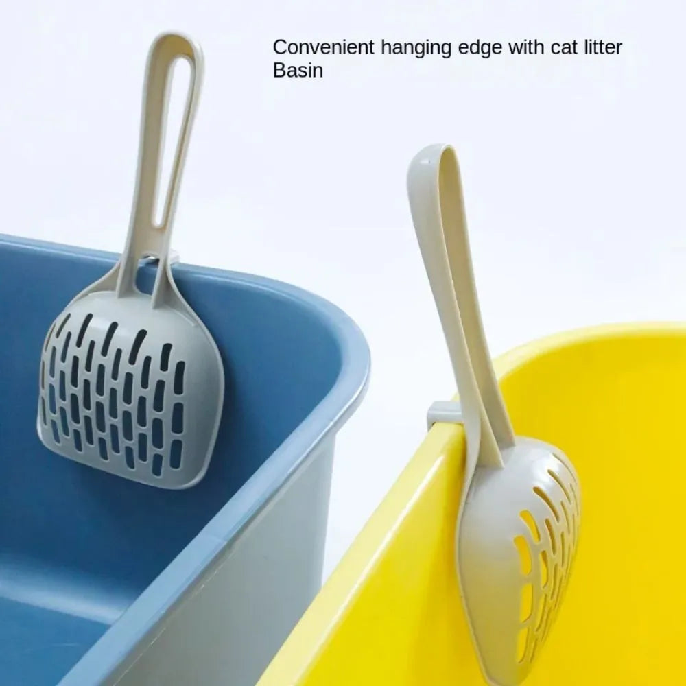 Grey plastic cat litter scoop with attached storage base for litter box cleaning