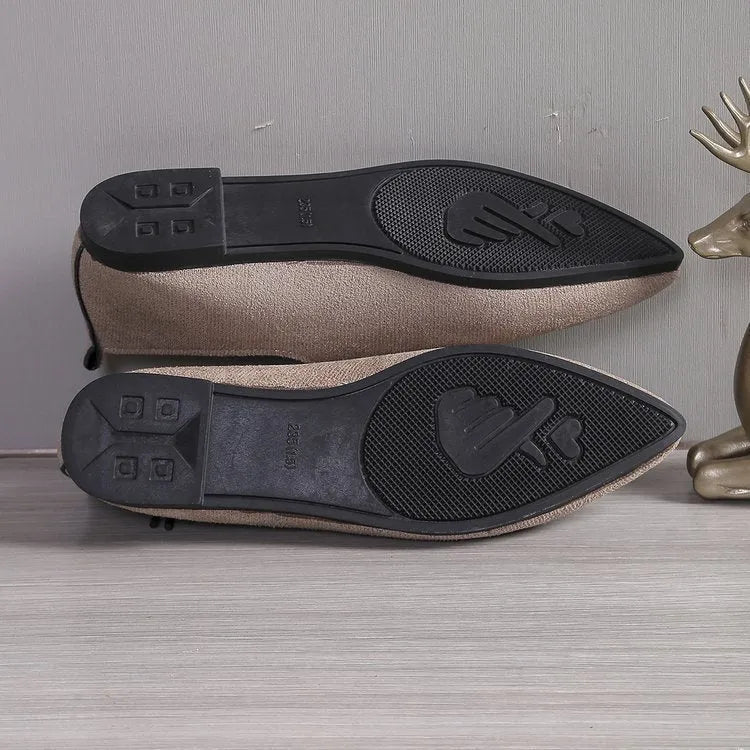 Beige leopard print women's pumps with pointed toe design and rubber sole