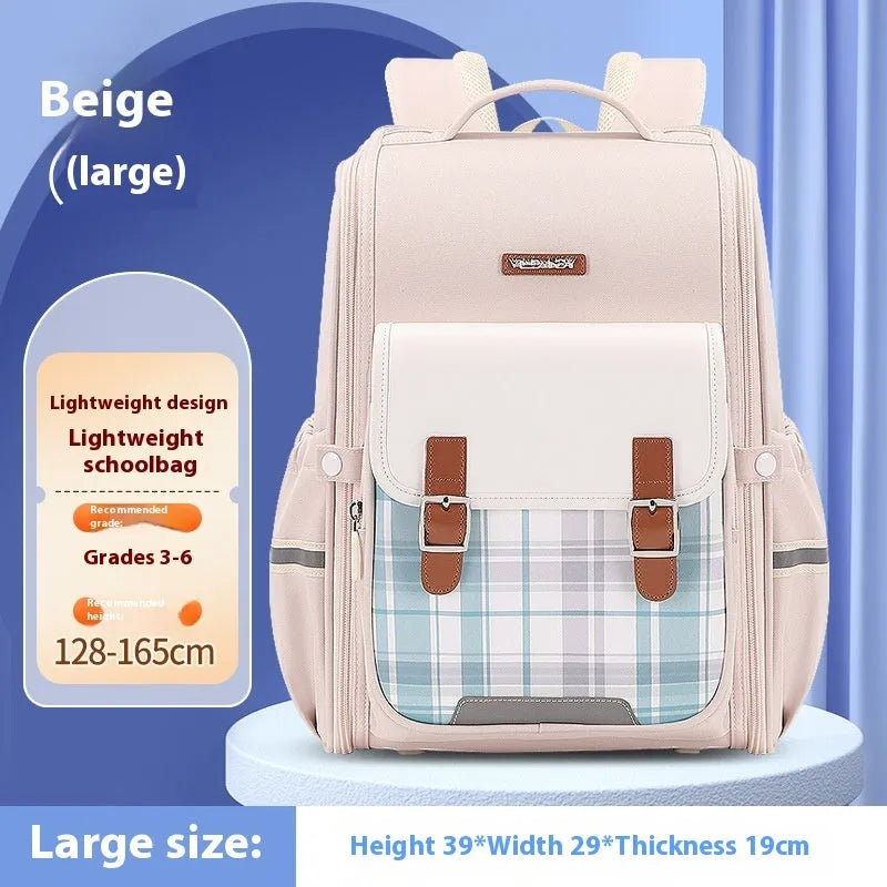 Lightweight Oxford cloth school backpack for students in navy blue, shown in a classroom setting.