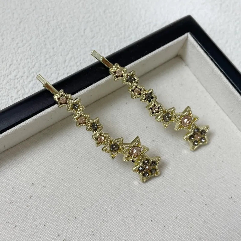 Gold rhinestone barrette with star charms for bangs and broken hairstyles