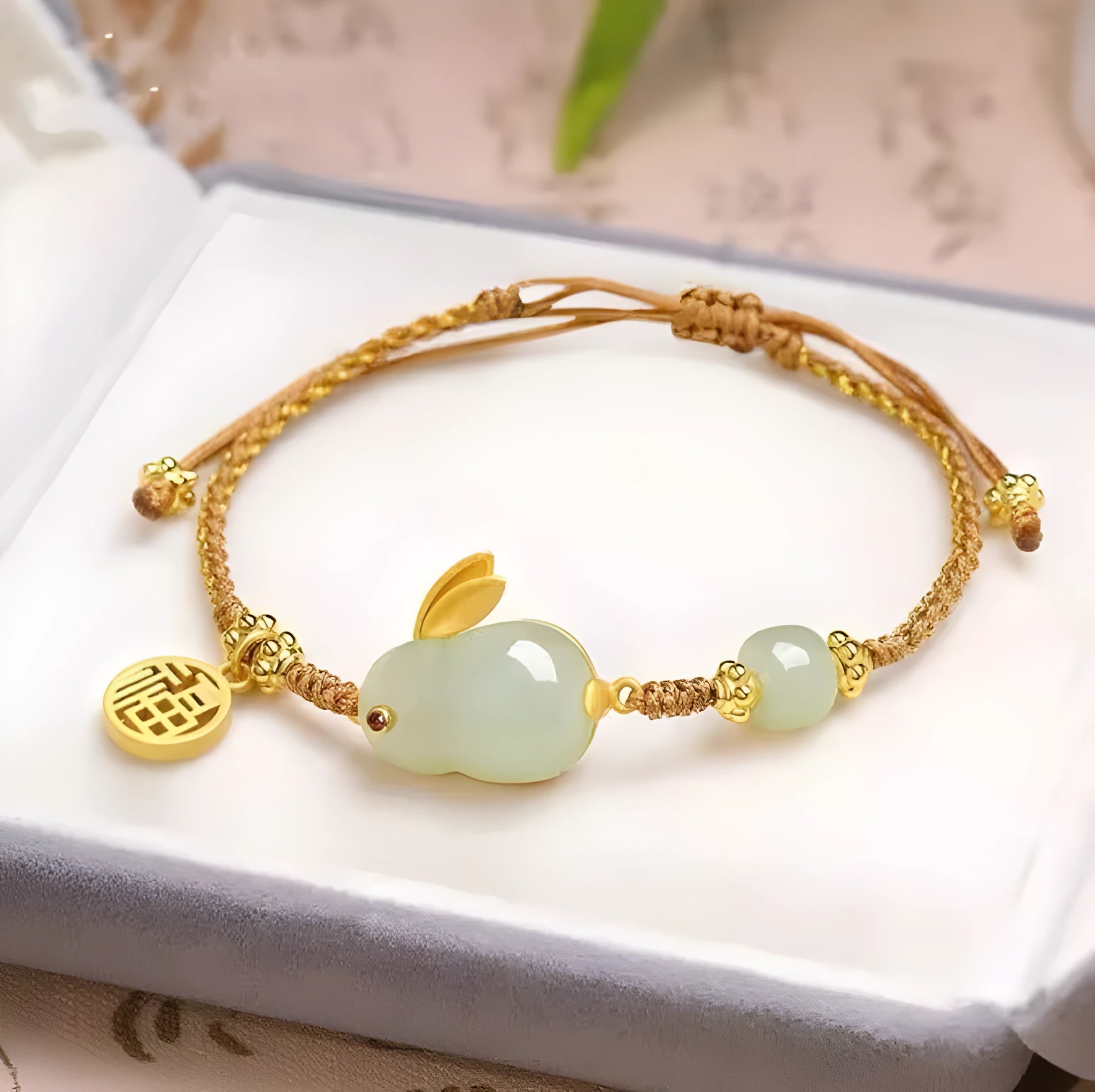Hetian jade rabbit bracelet with geometric charm on yellow string for women