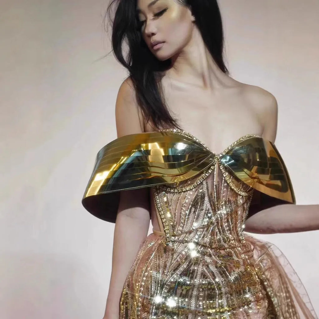 Gold women's strapless sequined dress with a split tulle skirt, long length, and mid waist fit