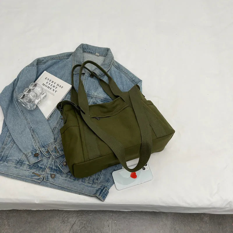 Women's polyester canvas shoulder bag with large capacity and mobile phone pocket in solid colour