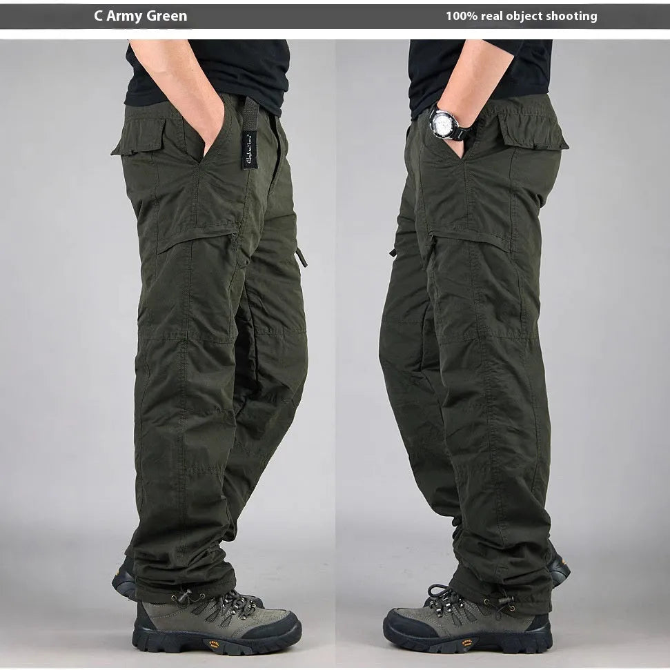 Men's stonewashed cotton overalls with a thick wool lining in khaki, shown with a loose straight-leg fit.