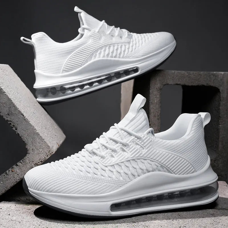 Men's low-top black mesh running shoes with lace-up front and rubber sole.