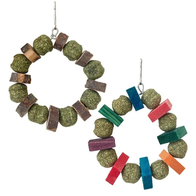 Applewood and straw ball ring chew toy for hamsters, guinea pigs, and rabbits on a white background.