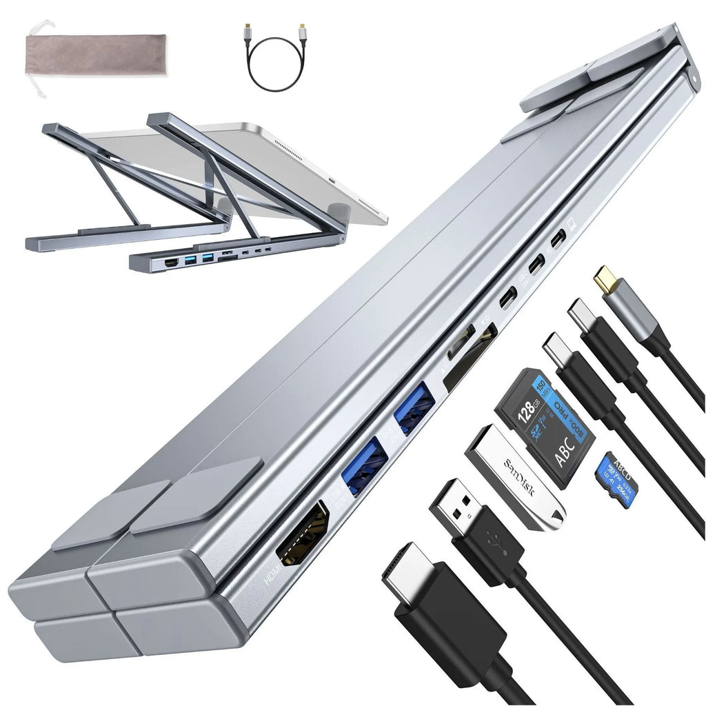 Silver aluminium alloy folding laptop stand with a built-in multi-port docking station hub.