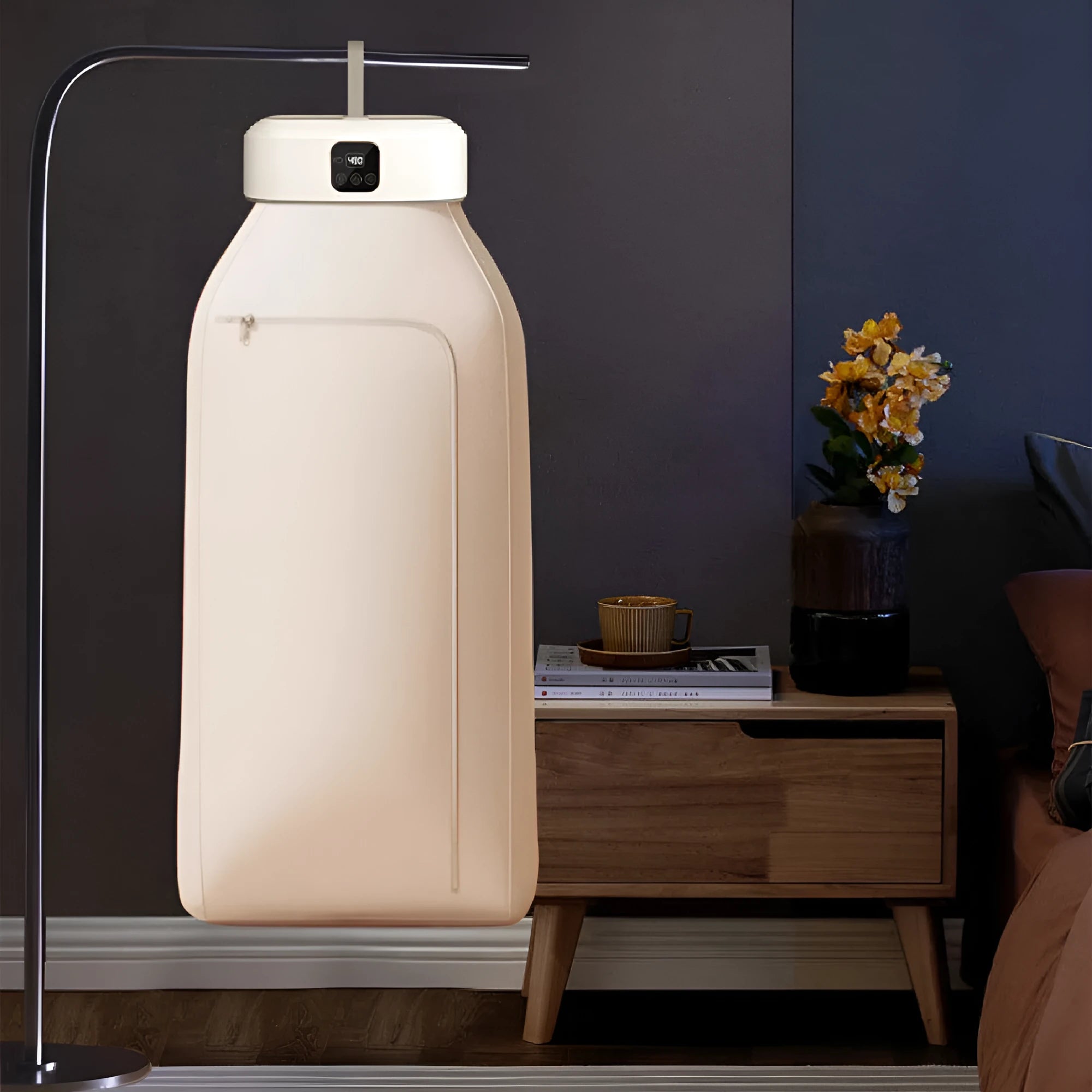 White cylindrical remote control clothes dryer with compact foldable design