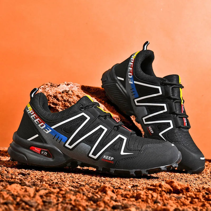 Men's gray orange casual running shoe with synthetic leather upper and low-top design.