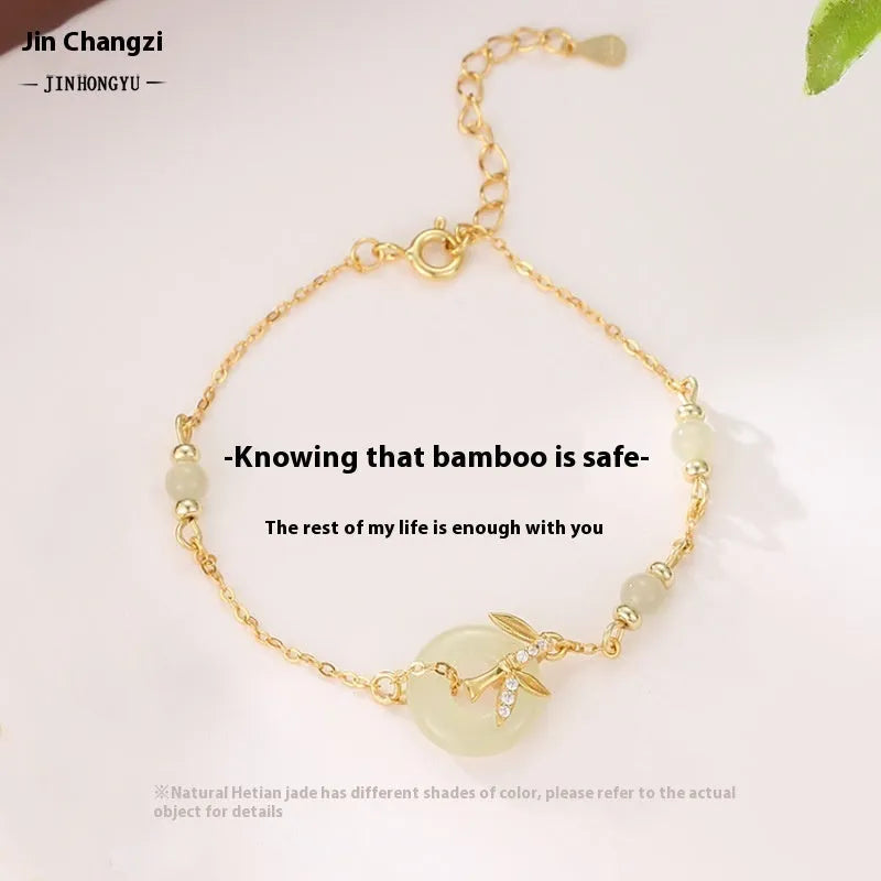 Women's Hetian Jade safety buckle bracelet in antique style with peace buckle design on 925 silver