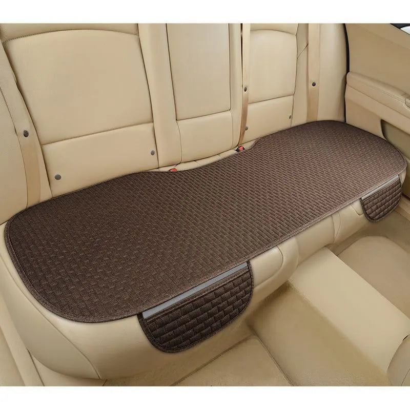 Linen car cushion in choice of three colours with hemmed edges for vehicle seating
