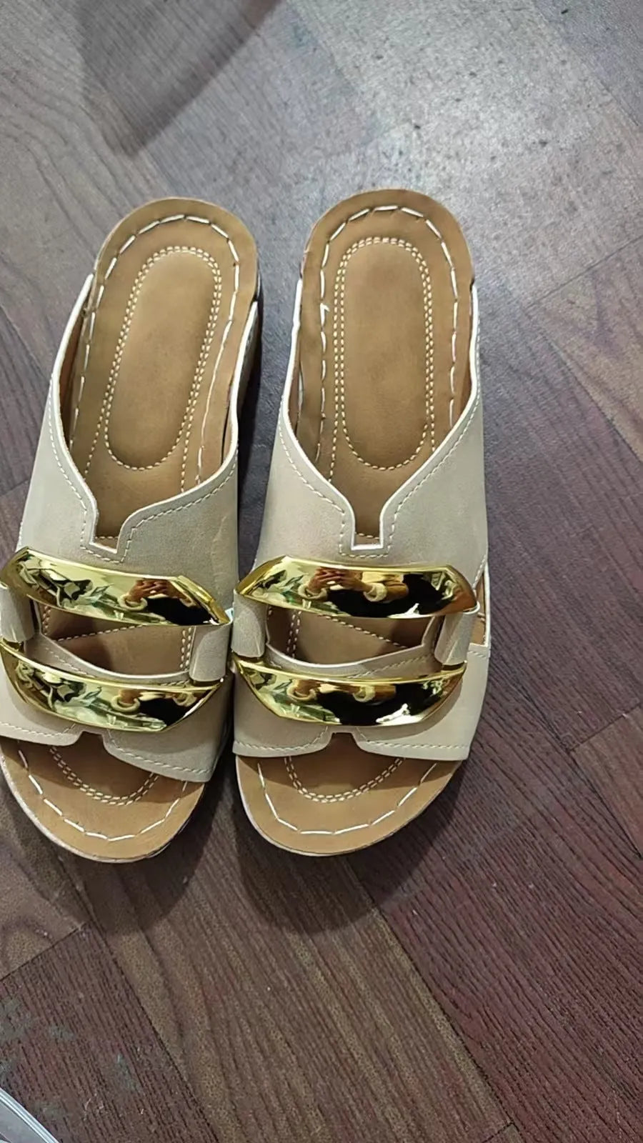 Adult Roman style platform sandals in a solid colour with a strap design and flat rubber sole.