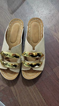 Adult Roman style platform sandals in a solid colour with a strap design and flat rubber sole.
