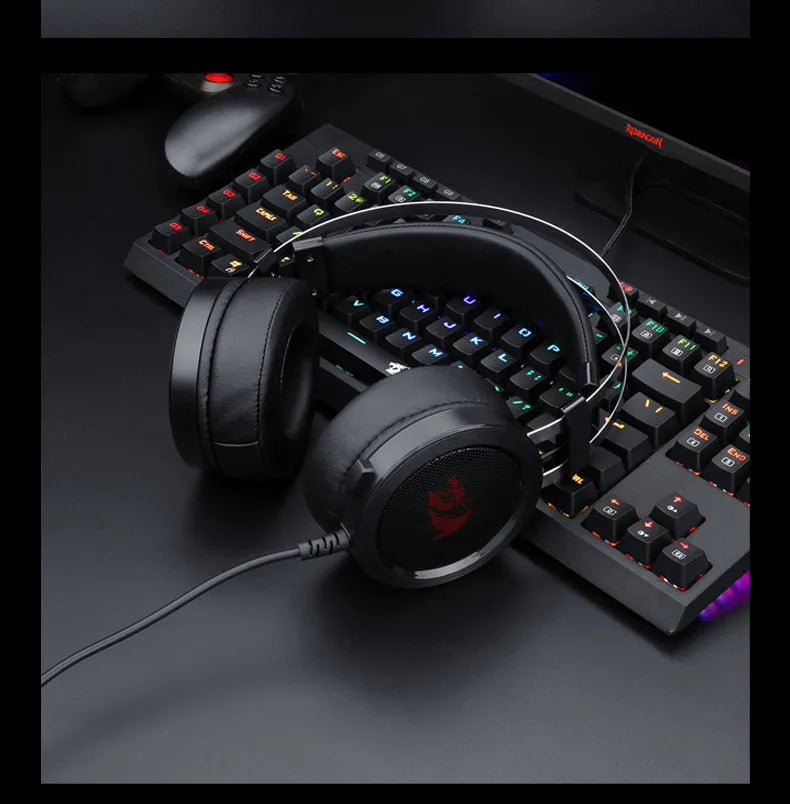 Black wired computer gaming headset with 3.5mm plug and long cable.