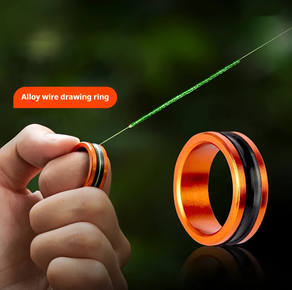 Orange and silver alloy fishing hand guard pull loop tool with a non-slip grip.