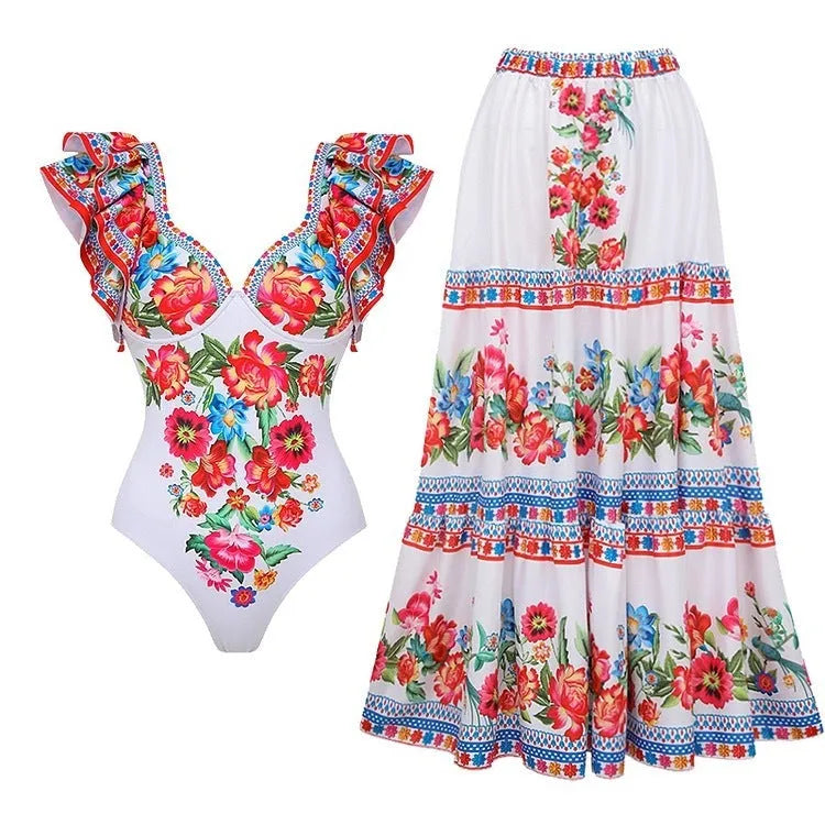 Women's printed one-piece swimsuit with matching cover-up skirt in rose pink.