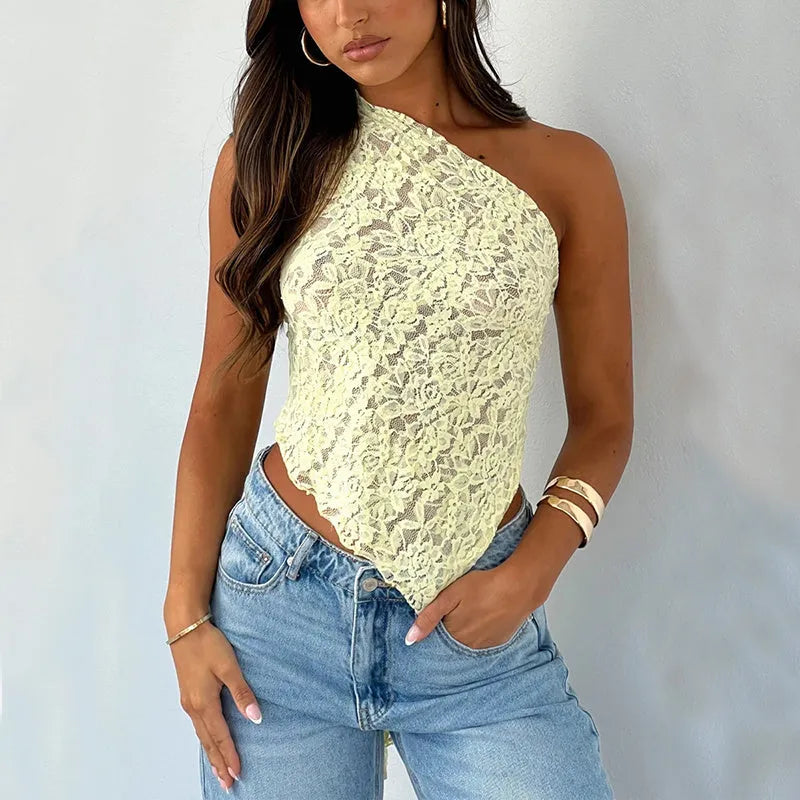 Womans lace backless vest top with asymmetrical sloped neckline in solid colour.