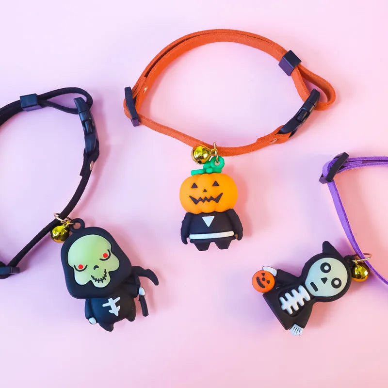Halloween dog collar decoration in luminous ghost, luminous skull, or pumpkin man patterns on a polyester band.