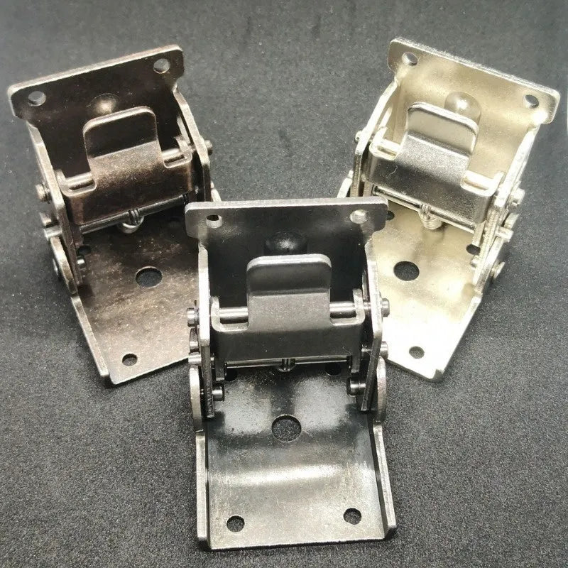 Close-up of a self-locking furniture folding hinge in an electroplated finish, set at a 90-degree angle.