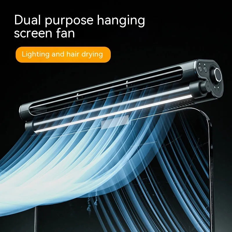 Black USB-powered bladeless clip fan with LED lighting attached to laptop screen
