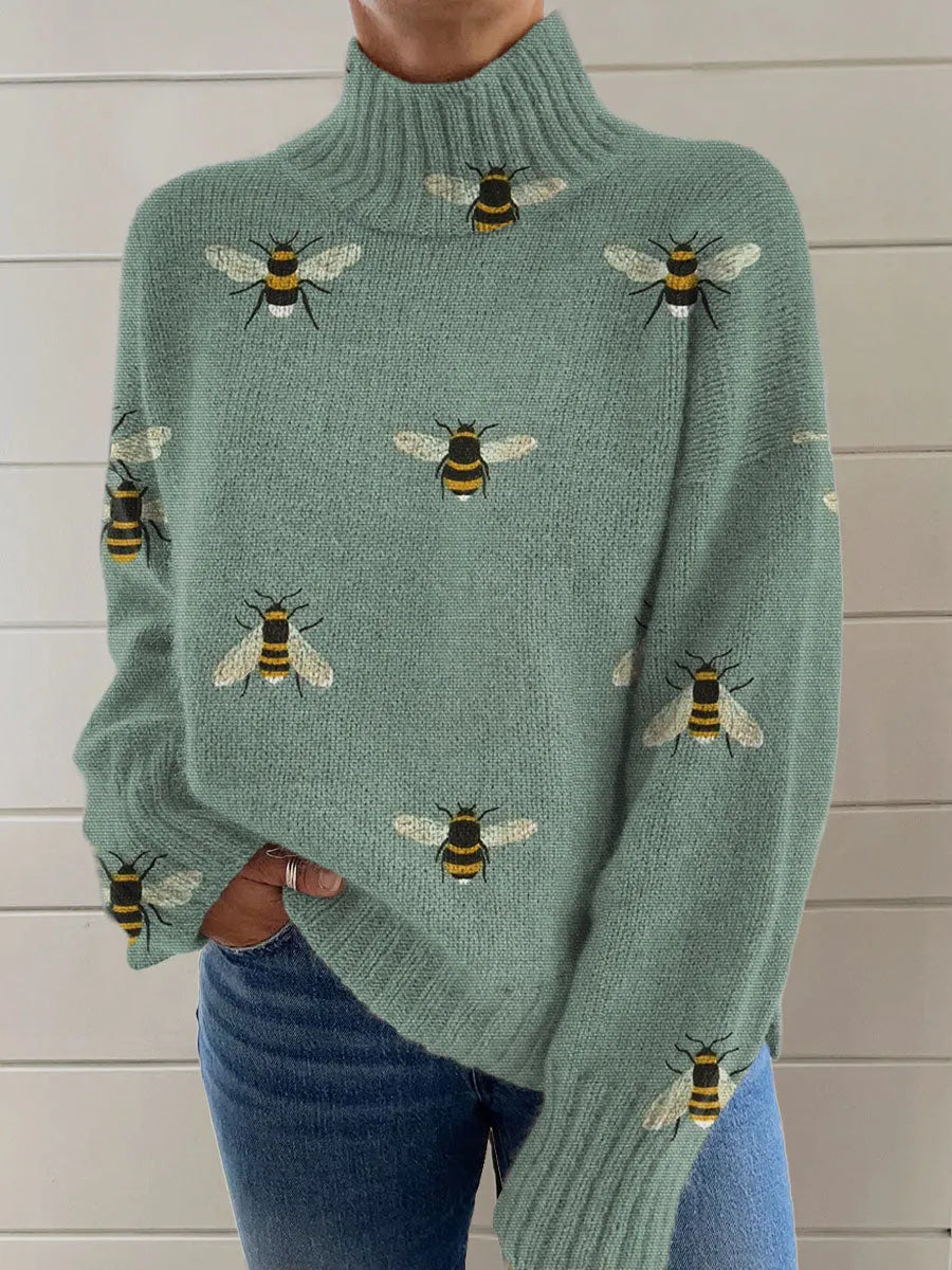 Women's loose fit Christmas print turtleneck sweater in a soft macaron colour.