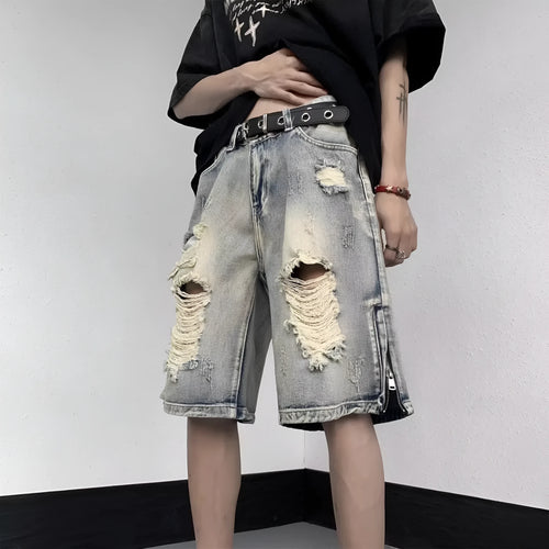 Blue distressed denim shorts with wide-leg loose fit and retro tattered styling on hanger