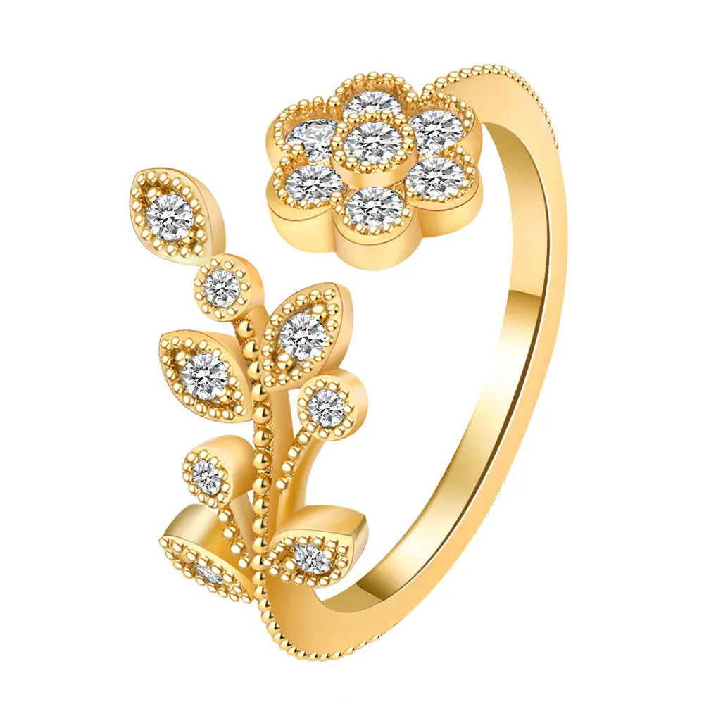 Women's open ring with diamond-treated flower and leaf designs on copper in gold colour option