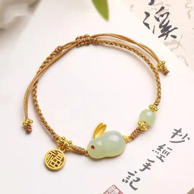 Hetian jade rabbit bracelet with geometric charm on yellow string for women