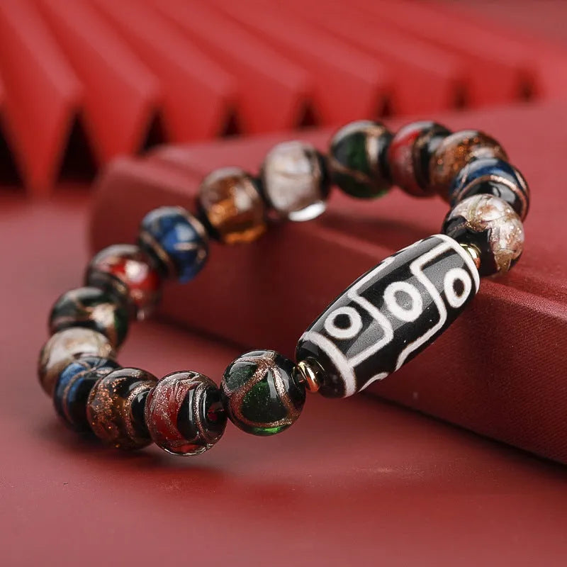 Chinese-style bracelet with colourful glazed beads showing snake patterns, available in 10mm 12mm or 14mm sizes