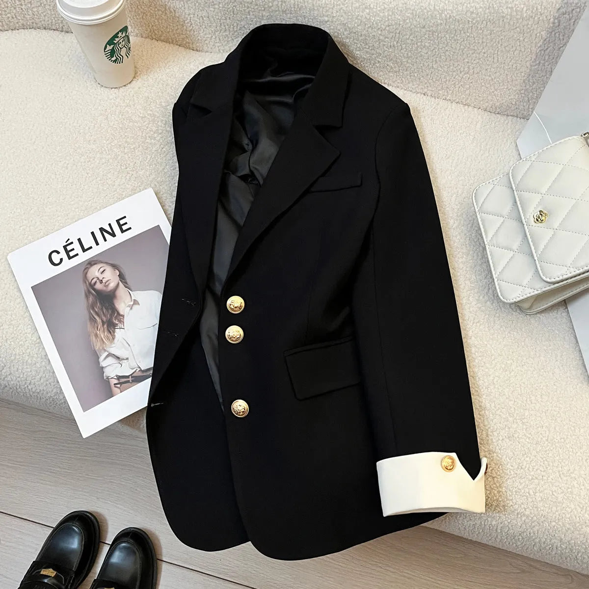 Women's Korean style loose fit polyester trench coat in milky white showing medium length and pocket details