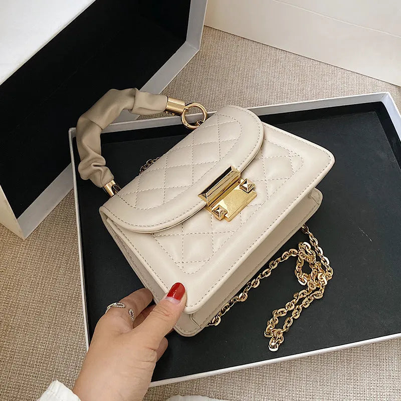 Purple rhombus-shaped ladies shoulder bag with chain strap and Korean styling