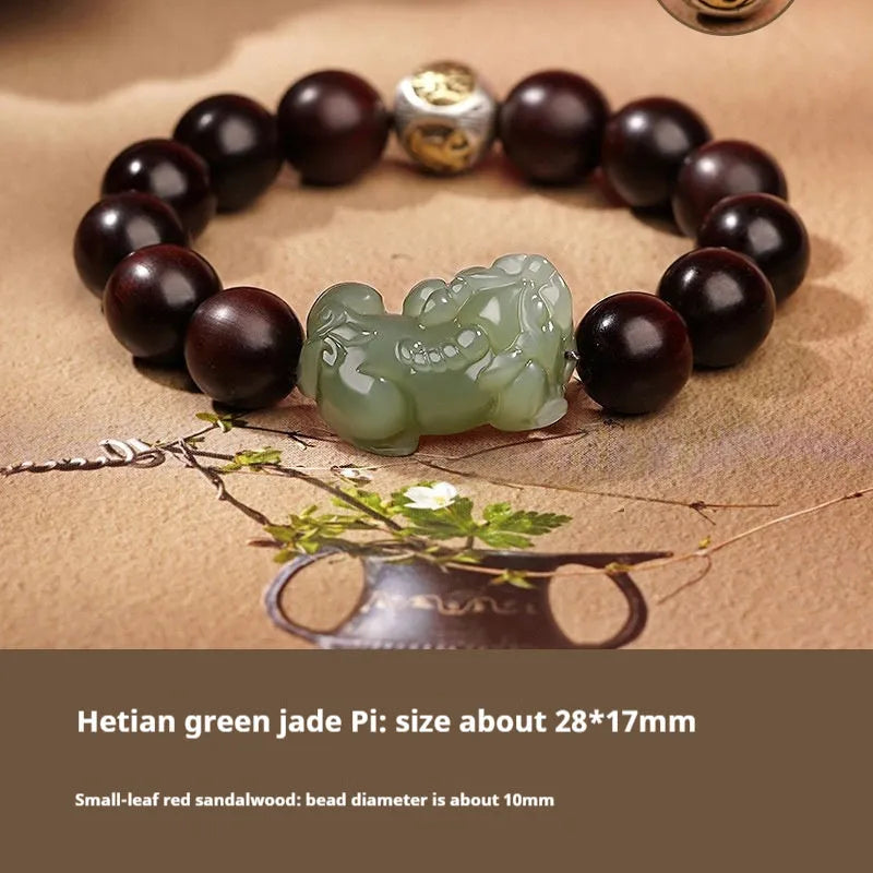 Hetian Jade bracelet with a black and red braided rope band and a central jade bead.