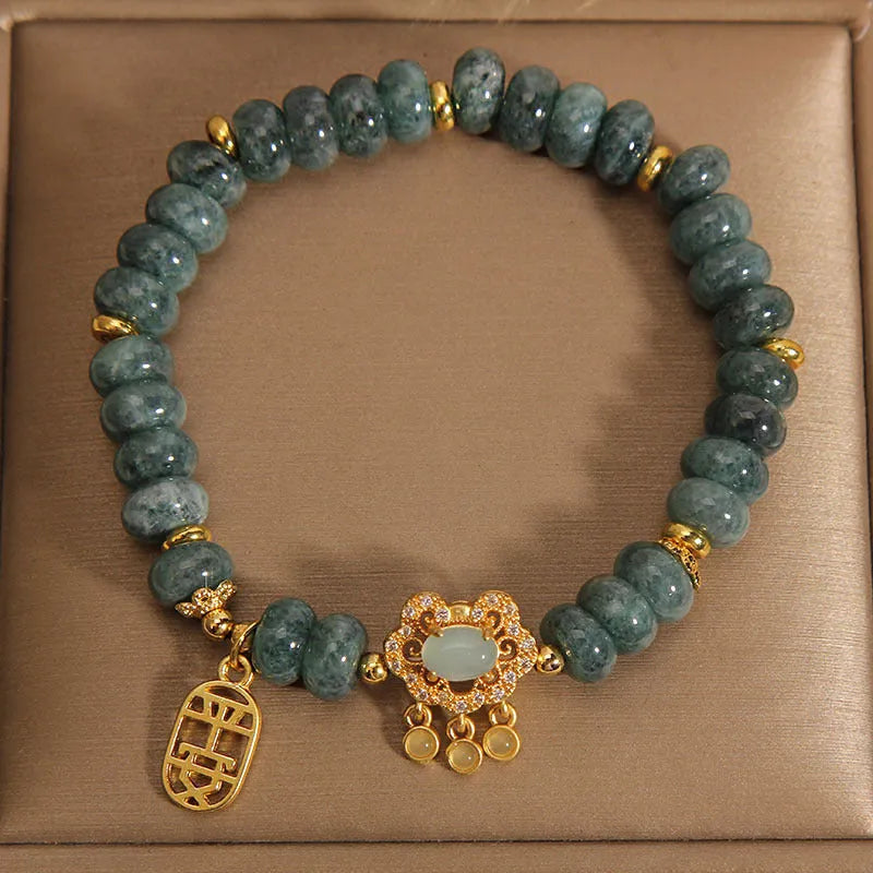 Women's natural emerald green jade bracelet with alloy safety lock clasp and abacus beads design