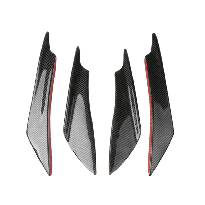 Set of four carbon fibre effect ABS plastic bumper air knife spoilers for car styling.