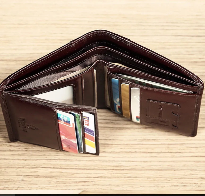 Men's leather wallet showing multiple internal compartments including card slots, coin pocket and photo window