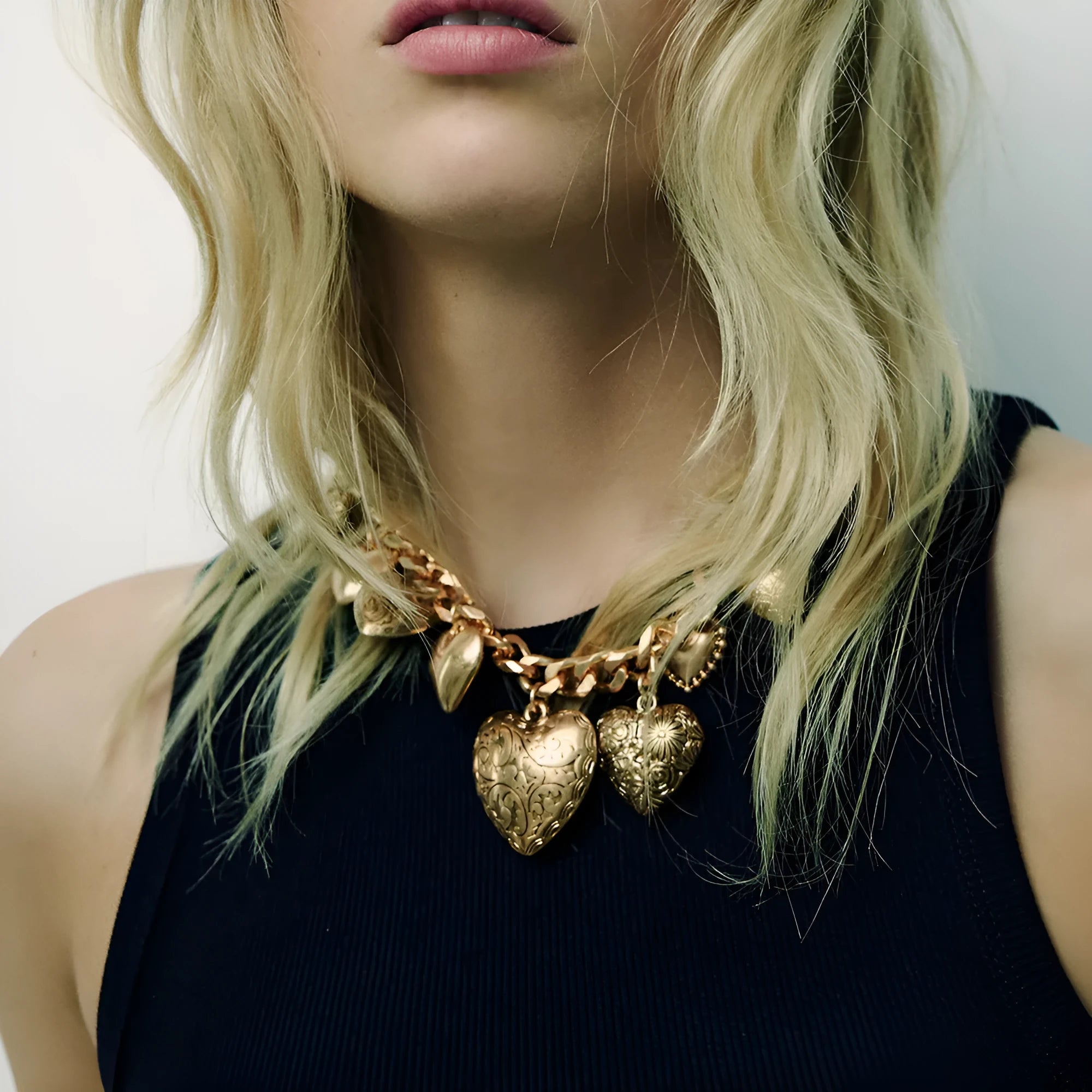 Carved heart pendant necklace with adjustable chain in gold or white K finish