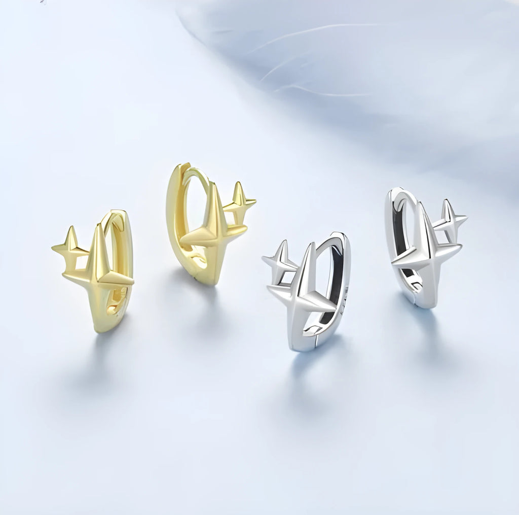 Minimalist star sterling silver ear clips with oxidised finish and XINGX element styling