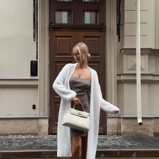 White women's cardigan sweater jacket with long sleeves and knitted texture