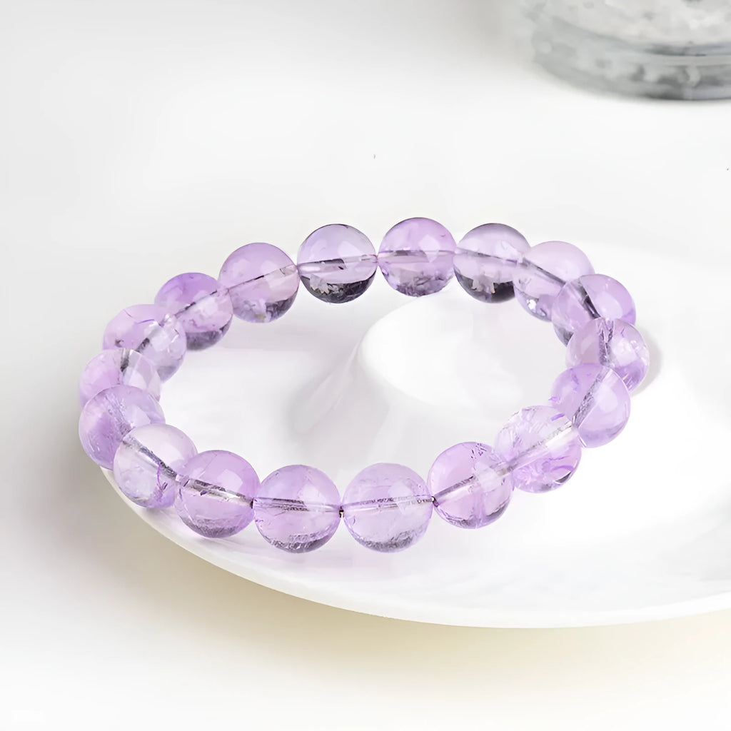 Lavender amethyst crystal bracelet with round beads in water ripple geometric pattern
