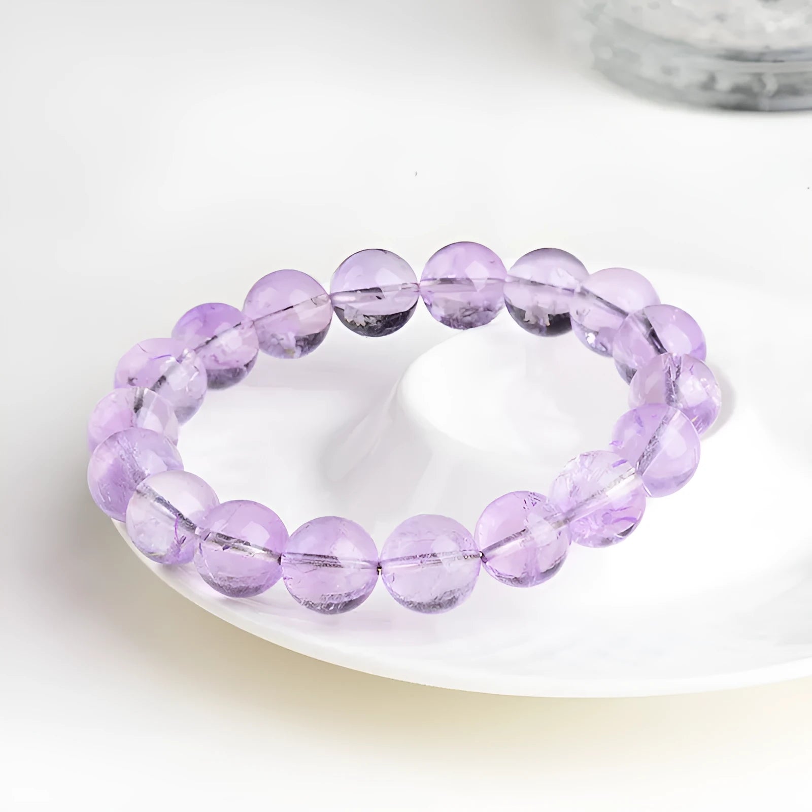Lavender amethyst crystal bracelet with round beads in water ripple geometric pattern