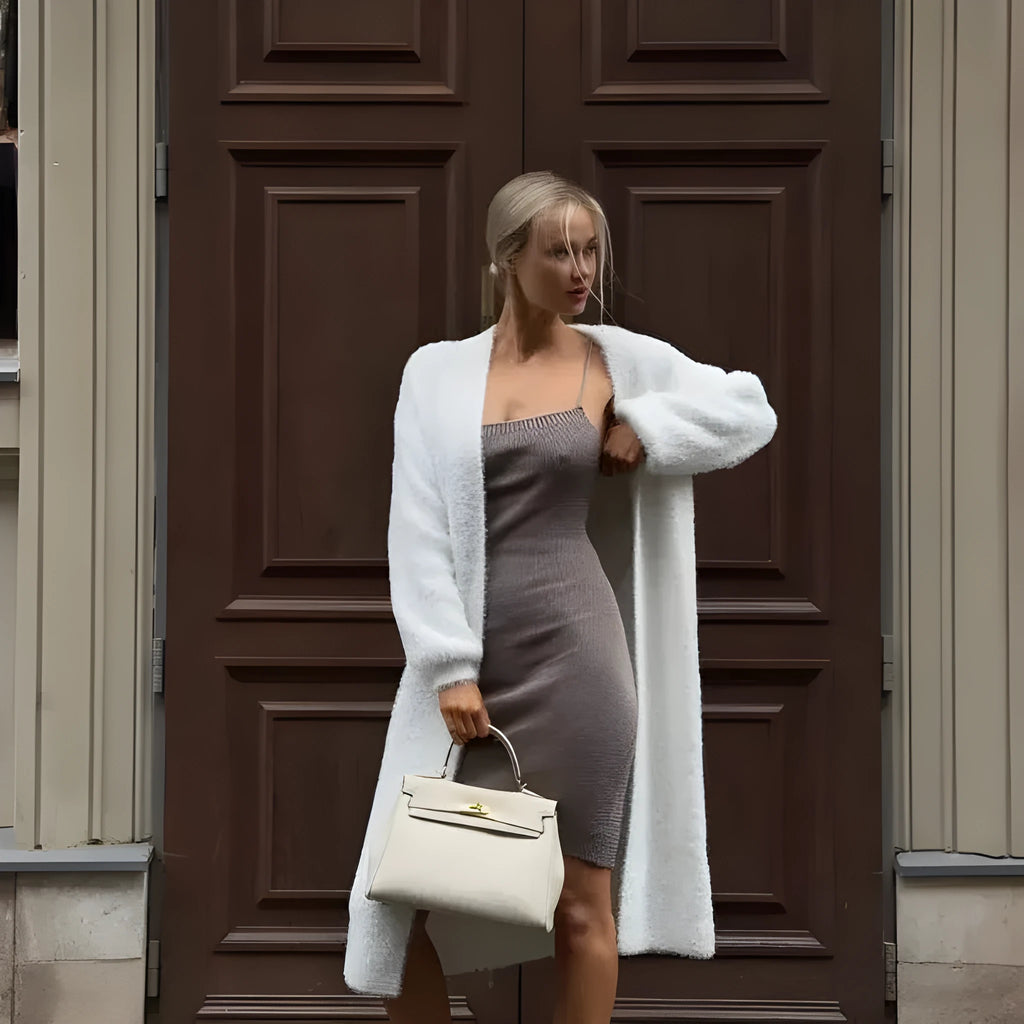 White women's cardigan sweater jacket with long sleeves and knitted texture