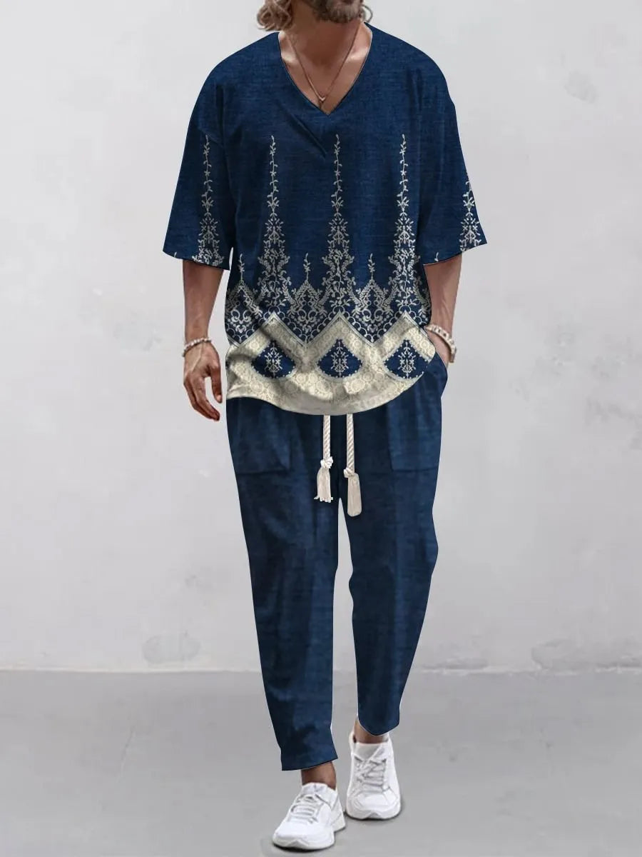 Cropped sleeve V-neck trousers suit set in thin polyester fabric on a hanger.