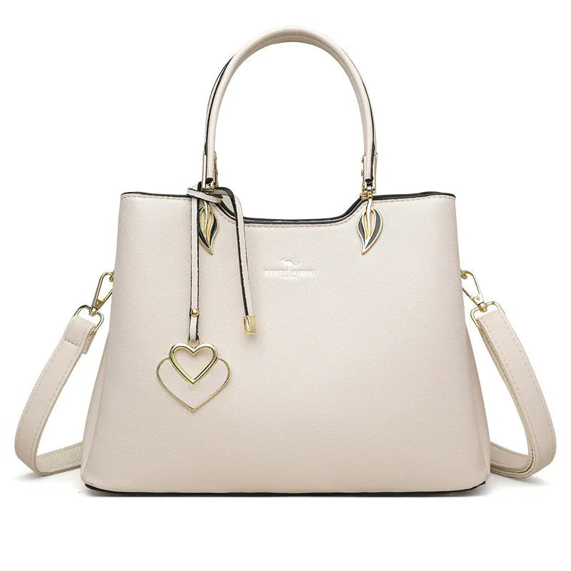 Women's PU leather messenger bag in multiple colours with cross-body strap and stitching detail