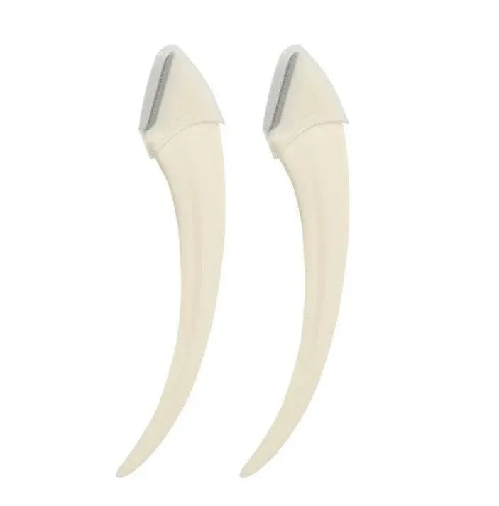 Curved moon-shaped eyebrow trimmer with a cutting comb on a white background.