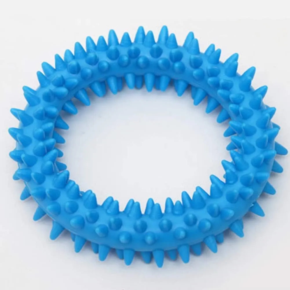 Blue TPR spiky ring dog chew toy with dental cleaning nubs on a white background