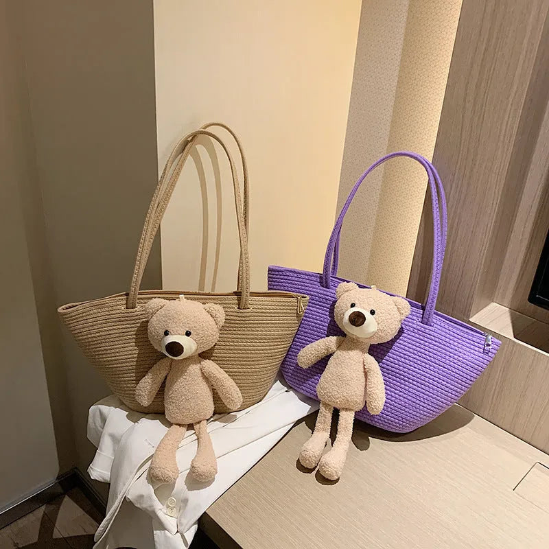 Cotton and linen woven bag with dumpling shape, double shoulder straps, and three-dimensional pocket