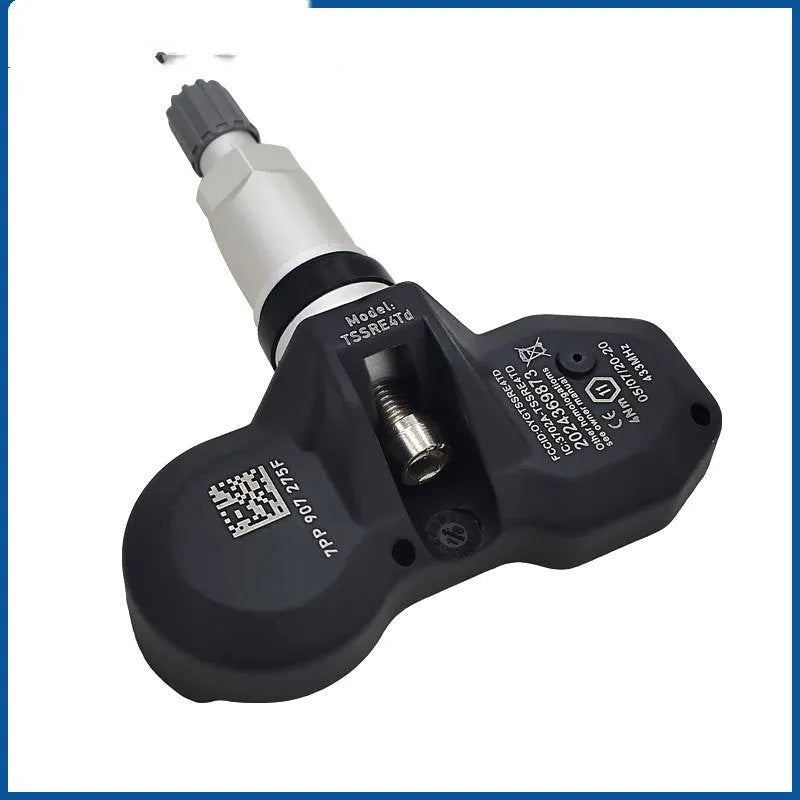 Black Audi tyre pressure monitoring system (TPMS) replacement sensor unit
